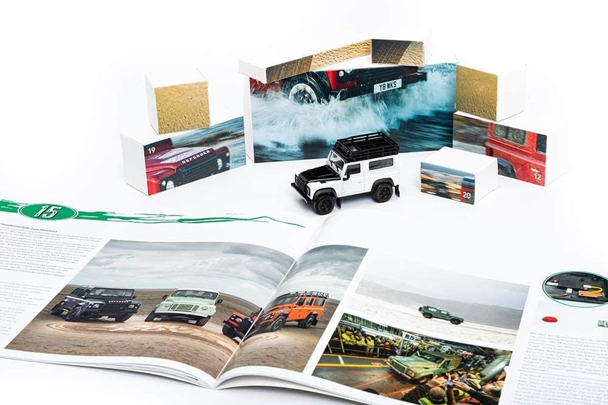 67155 - Calendario Dell'Avvento Land Rover Defender in Metallo, in Scala 1:43, Con Modulo Audio E Libro Di Accompagnamento Da 50 Pagine